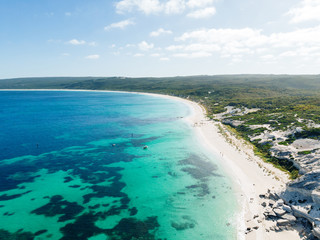 Obraz na płótnie Canvas Drone shot of the beautiful beach of Hamelin Bay on a perfect summers day with the beautiful blue water showing off the marine world, Western Australia.