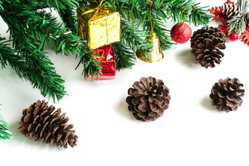 Fototapeta na wymiar Christmas composition. Coniferous tree branches , mock up gift , pine cones on white background. Christmas, winter, new year concept. Flat lay, close up