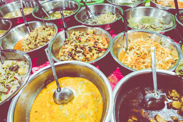 Food bazaar. Traditional buffet at local street food at Night Market at Luang Prabang. Laos.