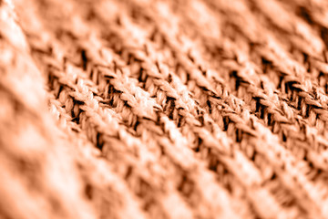 Knitted woolen texture close up. Textile background