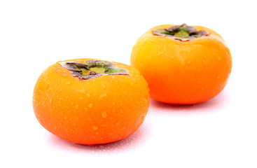 fresh  persimmons isolated on white background.