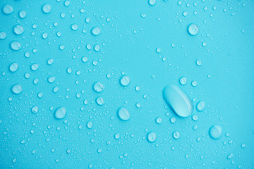 Water drops on blue background.