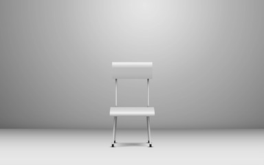 white chair in the white studio room
