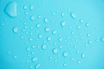 Water drops on blue background.