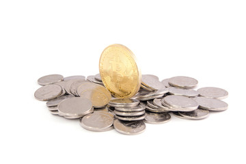 Bitcoin golden on top of other coins isolated on white background clipping path