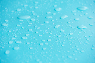 Water drops on blue background.