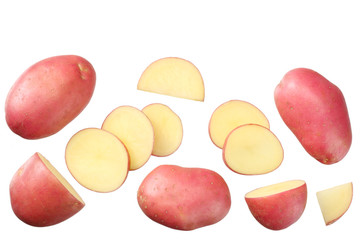 Raw red potato with slices isolated on white background. top view