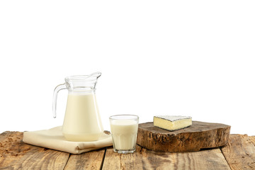 Different milk products, cheese, cream, milk on wooden table and white background. Healthy eating...