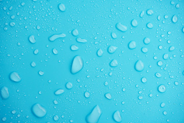 Water drops on blue background.