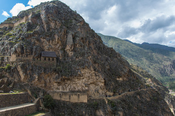 The ruins of the giant buildings and terraces near the town of Ollantaytambo (Peru)