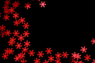 red snowflake glitter sparkle isolated on black background