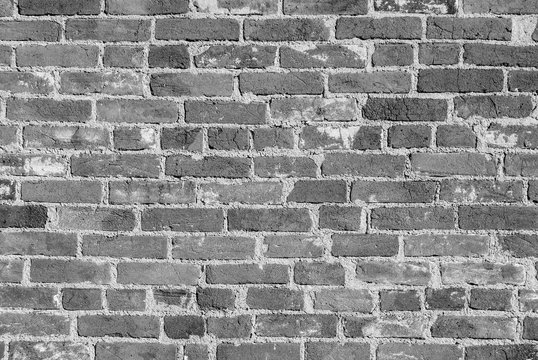 The background of the brick wall, black and white image. Can be used for interior design.