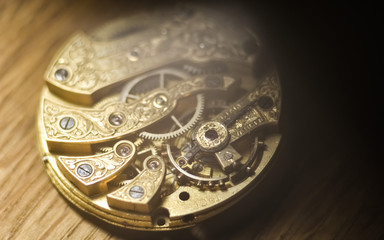  Close up inside mechanical vintage watch. Handmade engraving. Concept eternity, teamwork. Soft focus. Free space for text. Macro. Conceptual photo for your successful business design.