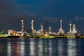 Obraz na płótnie Canvas Oil and gas refinery plant area at sunrise