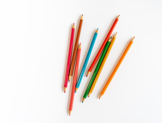 Colored pencils isolated on white background. 
