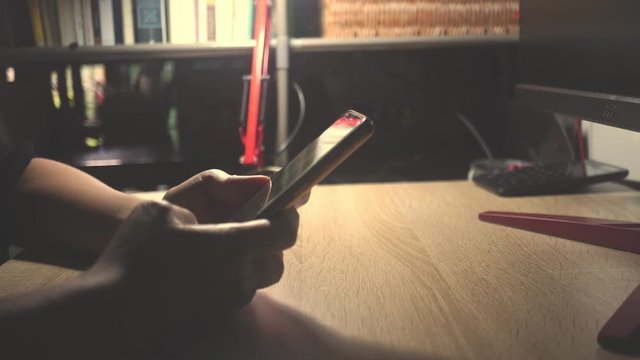 4K video woman hand using smartphone or tablet to do business, financial social network  with coffee cafe nature background