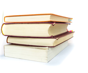 Stack of old books isolated on white background 