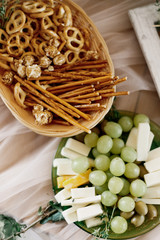 Fototapeta premium Snacks - grapes and cheese