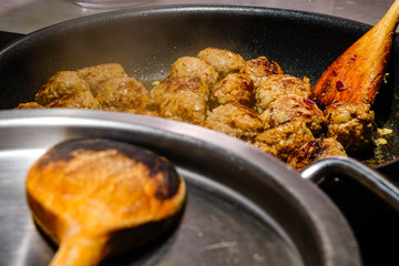 Making Swedish meatballs.