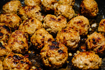 Making Swedish meatballs.