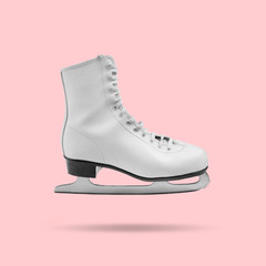 Floating white ice skate on pink background, minimal design