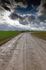 Wet gravel road after rain.