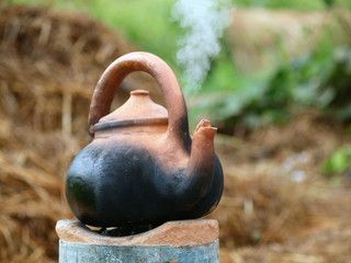 Pot made of clay, set on fire.
