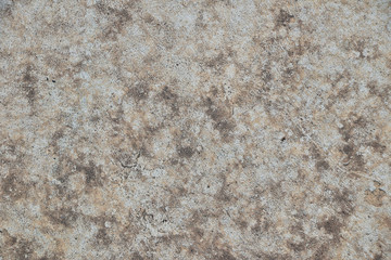 Grunge uneven concrete background texture with rust