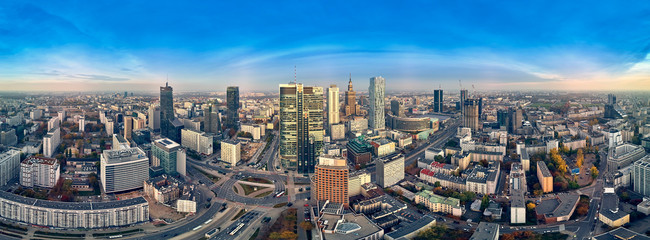 Beautiful panoramic aerial drone view to panorama cityscape of Warsaw modern City, PKiN and "Rondo 1" office skyscraper located at Rondo ONZ
