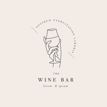 Vector design linear template logo or emblem - female hand holding glass of wine. Abstract symbol for wine bar or sommelier courses.