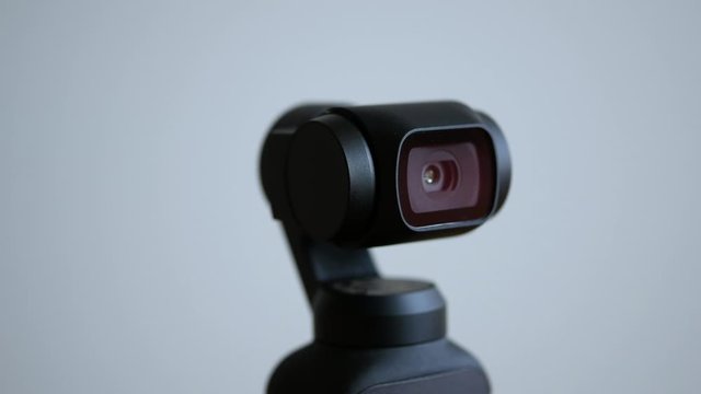 a camera that wakes up with its head turned like a robot.