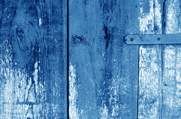 Grungy wooden planks background in navy blue color.