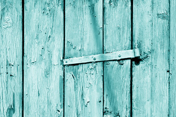 Grungy wooden planks background in cyan tone.