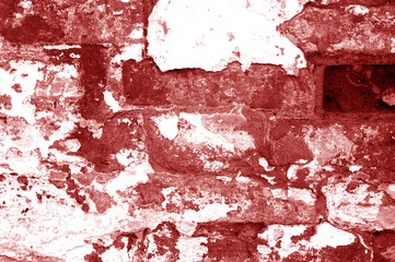 Old grungy brick wall texture in red tone.