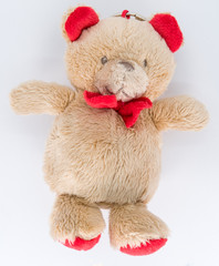 A little teddy bear with red ears