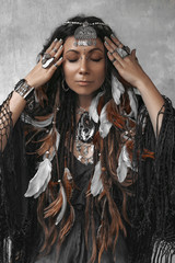 beautiful stylish woman with a lot of gem stones accessories close up portrait