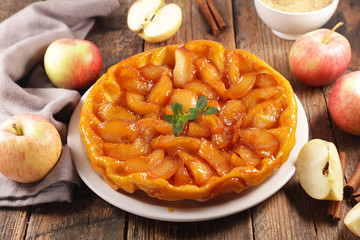 tarte tatin, french apple pie on wood background