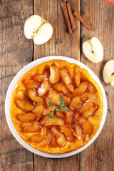 tarte tatin, french apple pie on wood background