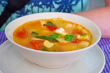 Tasty spicy soup Tom yum kung. Traditional thai dish.