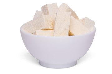 Rectangular yellow homemade banana marshmallows in bowl