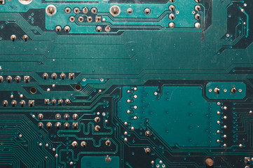Dusty circuit board abstract background. computer motherboard close up. micro elements of computer. Intelligent technology