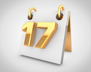 Desk calendar with gold design elements, day 17 of the month