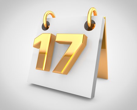 Desk calendar with gold design elements, day 17 of the month