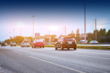 Obraz premium Car driving on road,Car on high way road and sunlight background