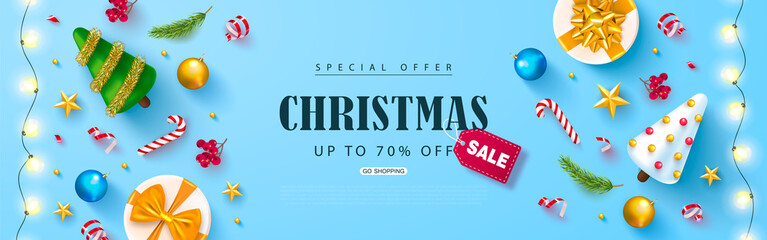 Christmas sale web banner. Holiday background with cute Christmas trees,gold stars, Rowan bunches, balls,gift boxes and candy.Vector illustration for website,posters,ads,coupons,promotional material.