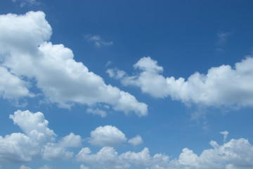 Naklejka na ściany i meble White clouds against the beautiful sky