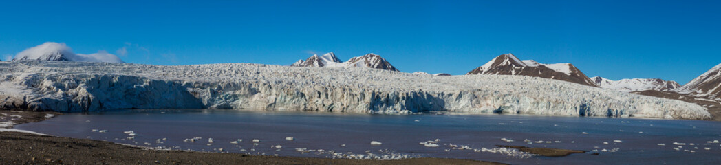 detailed panorama of Esmarkbreen glacier in Svalbard, blue sky