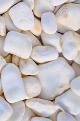 Fototapeta na wymiar Background of roundish stone. Texture in the form of white rocks. Background of big white stones.