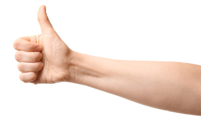 Hand of woman showing thumb-up gesture on white background