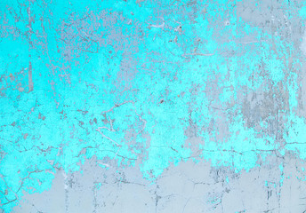Texture of an old plastered wall painted with blue and white paint.